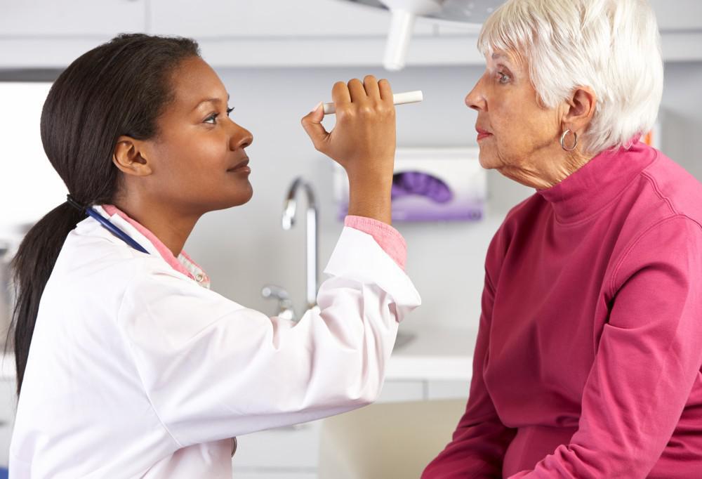 Woman having an examination from a doctor