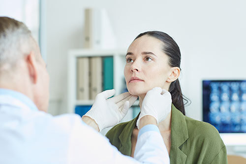 Doctor Giving a Patient Voice Therapy